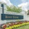 Entrance to Berry Farms beautifully landscaped with flowers,